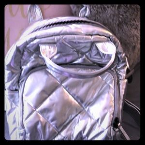 Silver quilted Mossimo backpack.